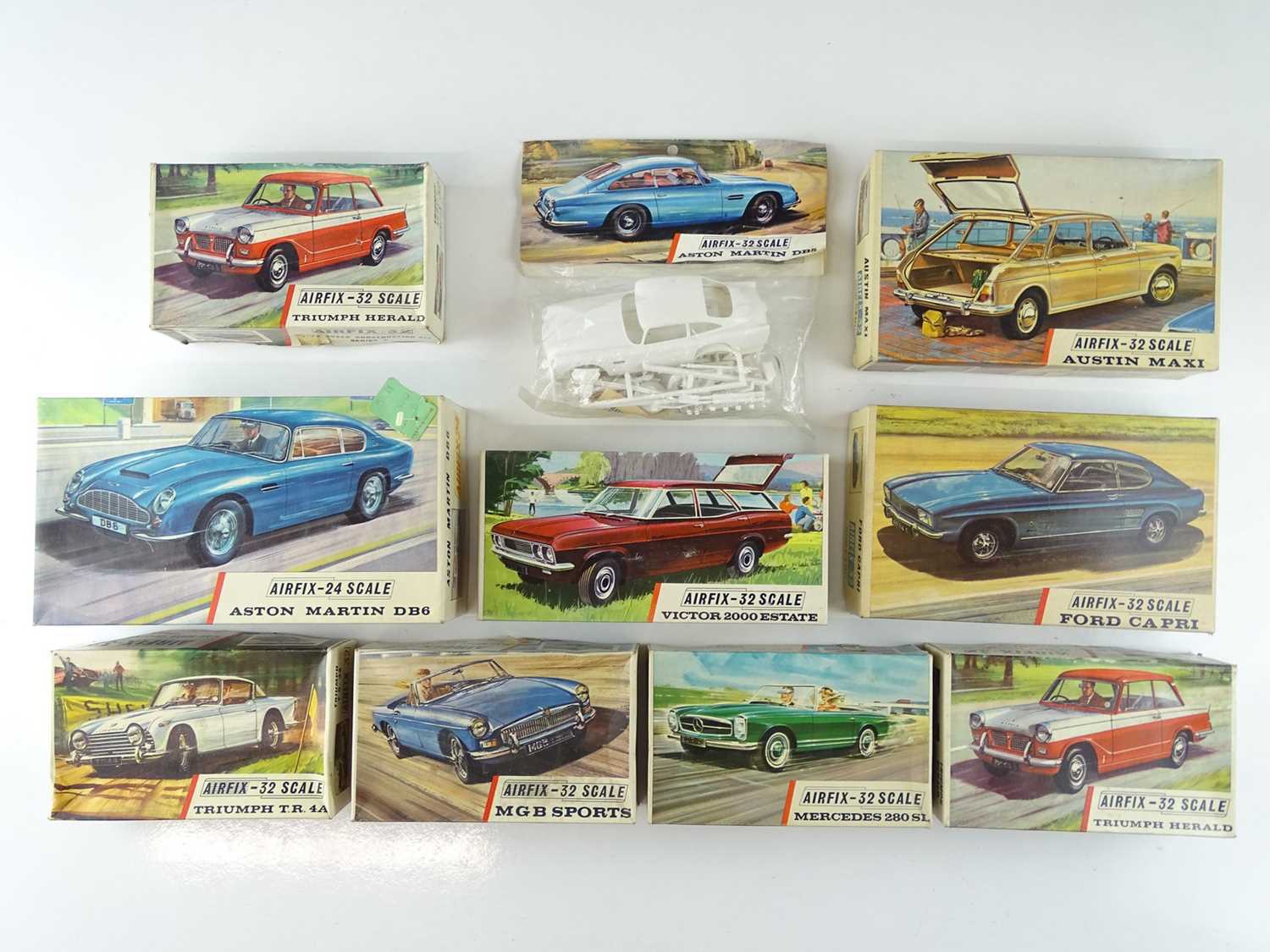 Lot 151 - A group of five unbuilt plastic car kits by...