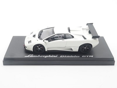 Lot 44 - A group of 1:43 scale models by KYOSHO and...