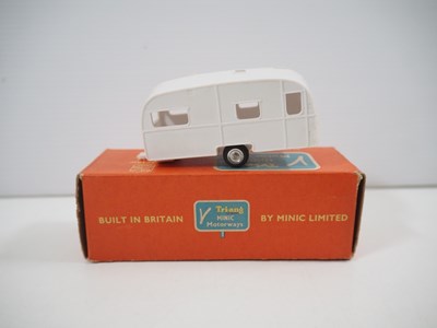 Lot 168 - A group of TRI-ANG Minic Motorways cars, fire...