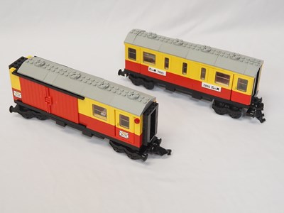Lot 65 - LEGO - TRAIN #7815 and #7819 4.5v train parts -...