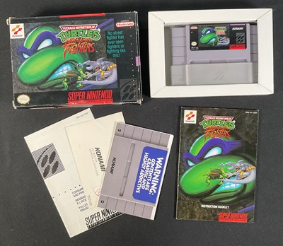 Lot 580 - SUPER NINTENDO (SNES) - A boxed and complete...