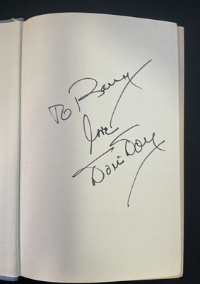Lot 73 - A pair of hardback books signed by female...