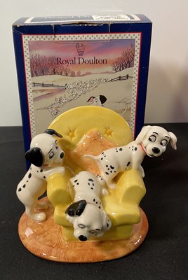 Lot 535 - A group of 4 Walt Disney ceramic figures...