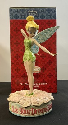 Lot 535 - A group of 4 Walt Disney ceramic figures...