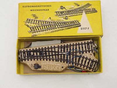 Lot 25 - MARKLIN - A quantity of 3-rail HO M-track plus...