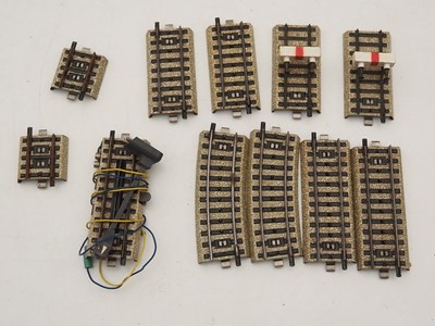 Lot 25 - MARKLIN - A quantity of 3-rail HO M-track plus...