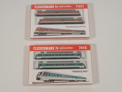 Lot 18 - FLEISCHMANN N gauge German Outline 2-car DMUs...