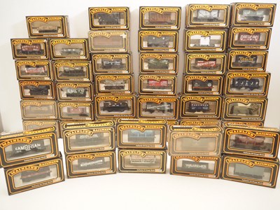 Lot 329 - MAINLINE OO gauge wagons - various types and...