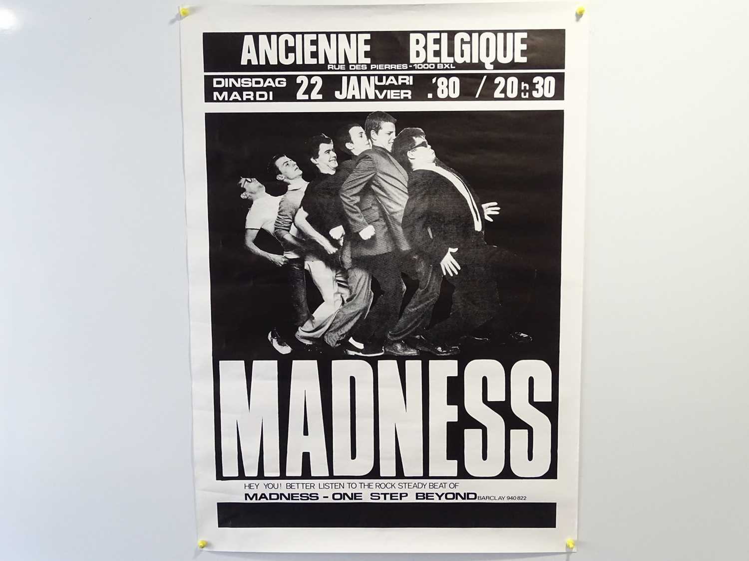 Lot 436 - MADNESS - A concert poster from a concert held...